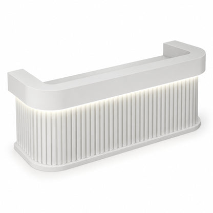 White curved reception desk with dual-level counter and LED-lit fluted front