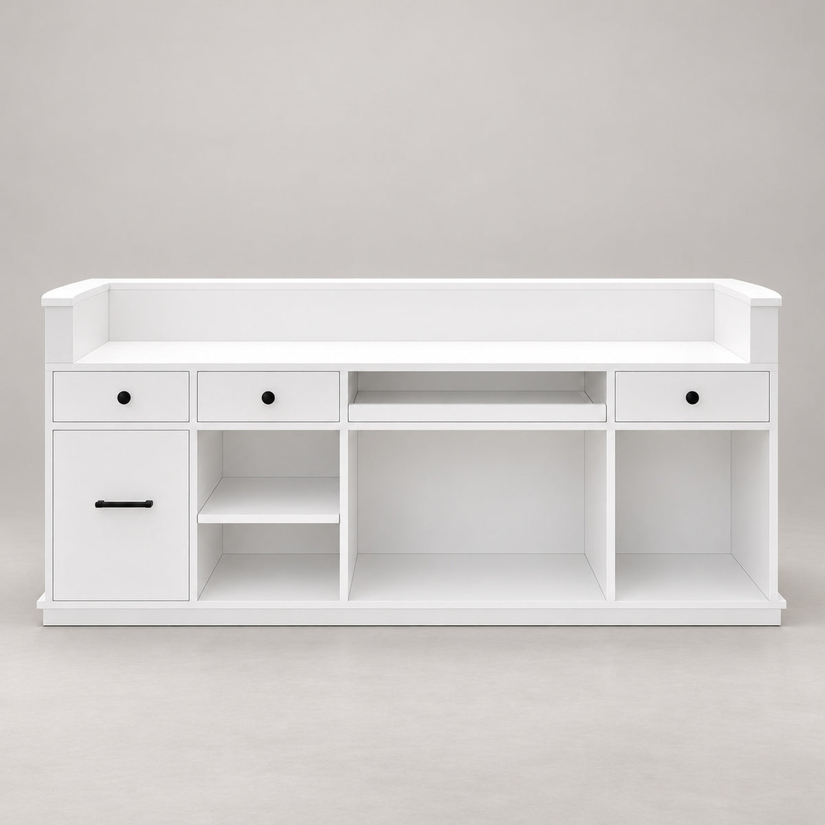 Staff-side view of curved reception desk with drawers, cabinet, keyboard tray and shelves