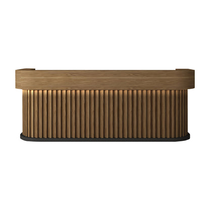 Brown wood-grain curved reception desk with fluted front