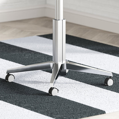 Close-Up View of Desk Base with Locking Caster Wheels